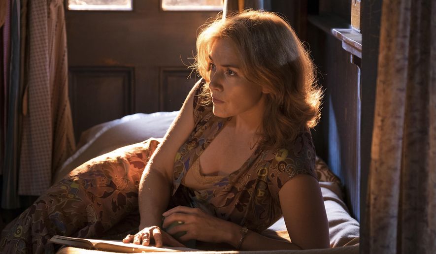 This image released by Amazon Studios shows Kate Winslet in a scene from "Wonder Wheel." (Jessica Miglio/Amazon Studios via AP)