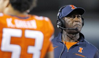 FILE - In this Sept. 29, 2017, file photo, Illinois coach Lovie Smith watches from the sideline during the second half of the team&#39;s NCAA college football game against Nebraska, in Champaign, Ill. Illinois started off the season with a pair of home victories and then things went sour as the Illini lost their next 10 games and finished the year as the only team in the Big Ten without a conference victory. (AP Photo/Stephen Haas, File)