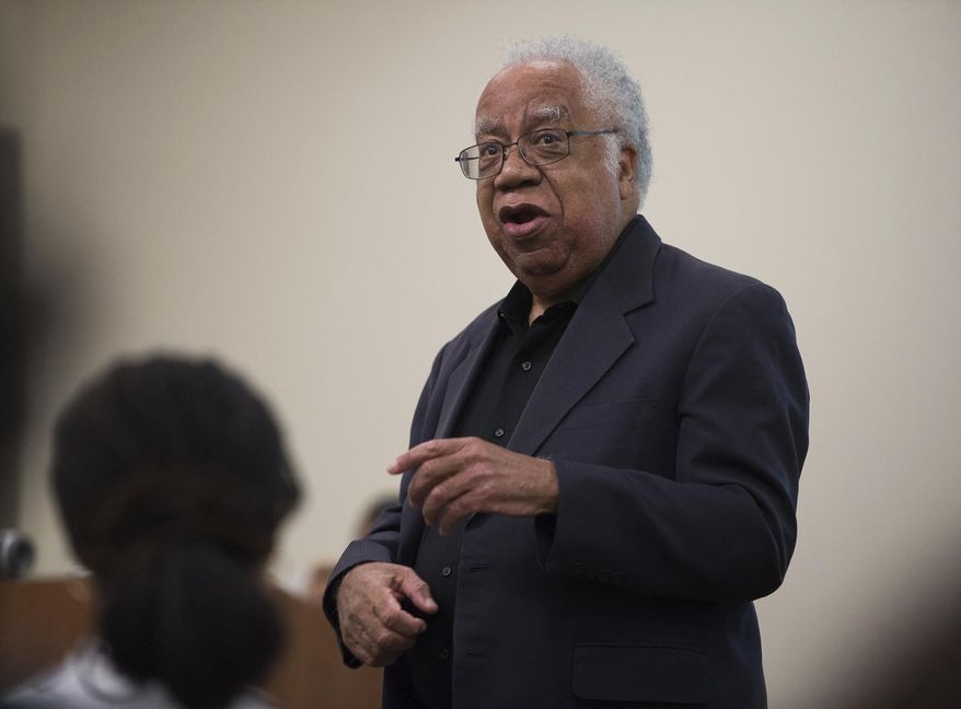 This 2015 photo provided by the University of California, Irvine shows Joseph L. White, speaking at the university in Irvine, Calif. White, a psychologist, social activist and teacher who helped pioneer the field of black psychology to counter what he saw as rampant ignorance and prejudice in the profession, has died. He was 84. (Steve Zylius/UCI via AP)