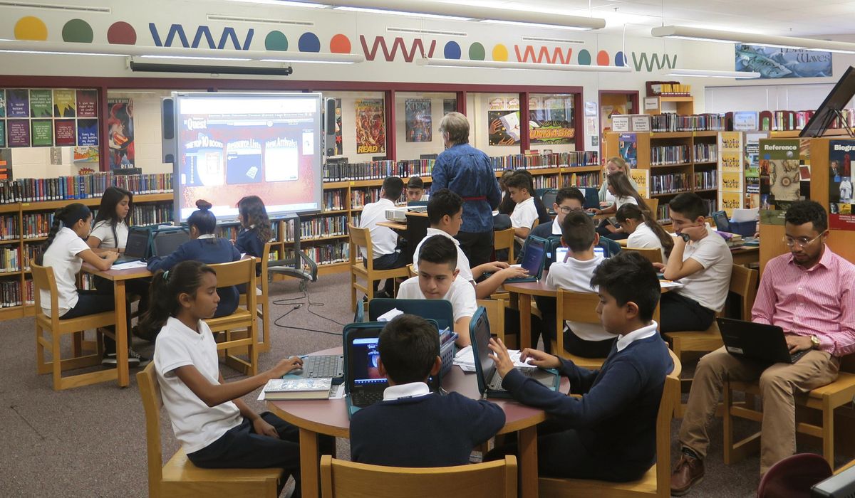 NextImg:Reports find higher satisfaction, less funding at charter schools