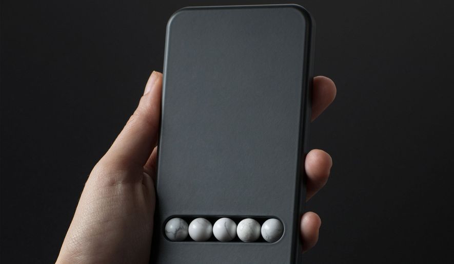 The &quot;Substitute Phone&quot; from Austrian designer Klemen Schillinger provides therapeutic motions for those who can&#39;t stop scrolling, zooming and swiping. (Image from Klemen Schillinger/Dezeen)
