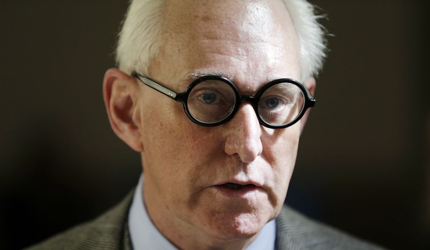 In this March 30, 2017, file photo, Roger Stone talks to reporters outside a courtroom in New York. (AP Photo/Seth Wenig, File)
