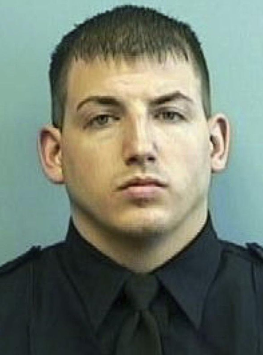 FILE - This undated file photo provided by the Baltimore Police Department shows Wayne Jenkins. Jenkins, one of the members of the disbanded Gun Trace Task Force, is facing new charges alleging he planted heroin during a 2010 arrest. (Baltimore Police Department via AP, File)