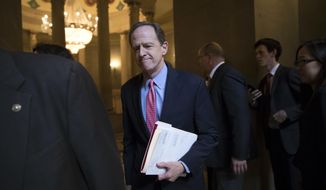 Sen. Pat Toomey, R-Pa., a member of the tax-writing Senate Finance Committee, and other Republican senators gather to meet with Senate Majority Leader Mitch McConnell, R-Ky., on the GOP effort to overhaul the tax code, on Capitol Hill in Washington, Friday, Dec. 1, 2017. (AP Photo/J. Scott Applewhite)