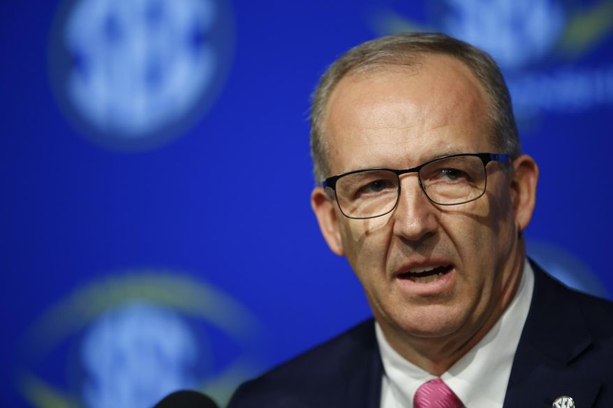 SEC Commissioner Greg Sankey speaks with the media during an NCAA college football news conference for the Southeastern Conference championship game at the Mercedes-Benz Stadium in Atlanta, Friday, Dec. 1, 2017. Auburn and Georgia meet on Saturday for the SEC title. (Joshua L. Jones,/Athens Banner-Herald via AP)