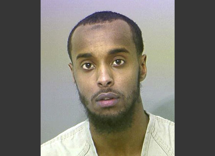 FILE - This undated file photo provided by the Franklin County Sheriff's Office shows Abdirahman Sheik Mohamud. A federal judge has excused himself from the case of the Ohio man who admitted he plotted to kill military members in the U.S. Judge James Graham filed the notice of recusal in federal court Wednesday, Nov. 30, 2017, without explanation in the case of defendant Mohamud. Mohamud pleaded guilty in August 2015 to supporting terrorism and making false statements to authorities. (AP Photo/Franklin County Sheriff's Office via AP, File)