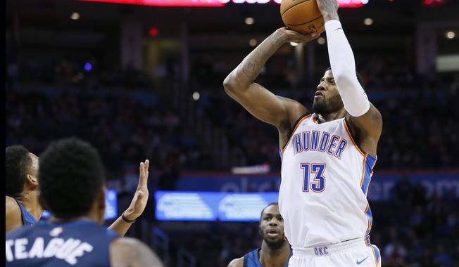 Oklahoma City Thunder forward Paul George (13) shoots against the Minnesota Timberwolves during the second quarter of an NBA basketball game in Oklahoma City, Friday, Dec. 1, 2017. (AP Photo/Sue Ogrocki)