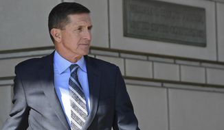 Former Trump national security adviser Michael Flynn leaves federal court in Washington, Friday, Dec. 1, 2017. Flynn pleaded guilty Friday to making false statements to the FBI, the first Trump White House official to make a guilty plea so far in a wide-ranging investigation led by special counsel Robert Mueller.  (AP Photo/Susan Walsh)