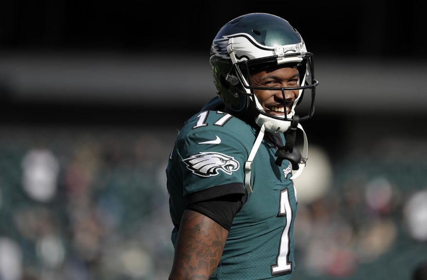 FILE - In this Sunday, Nov. 26, 2017, file photo, Philadelphia Eagles' Alshon Jeffery smiles before an NFL football game against the Chicago Bears, in Philadelphia. The Eagles have signed Jeffery to a four-year contract extension that runs through 2021. The deal announced Saturday, Dec. 2, 2017, is reportedly worth $52 million, with $27 million guaranteed. (AP Photo/Michael Perez, File)
