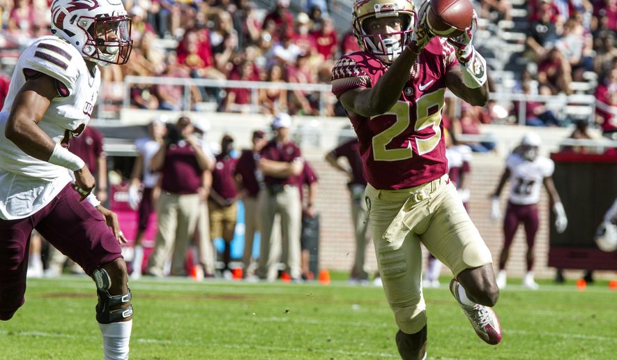 Florida State wide receiver D.J. Matthews (29) makes his first touchdown catch in front of Louisiana Monroe cornerback Marcus Hubbard during the first half of an NCAA college football game in Tallahassee, Fla., Saturday, Dec. 2, 2017. (AP Photo/Mark Wallheiser)