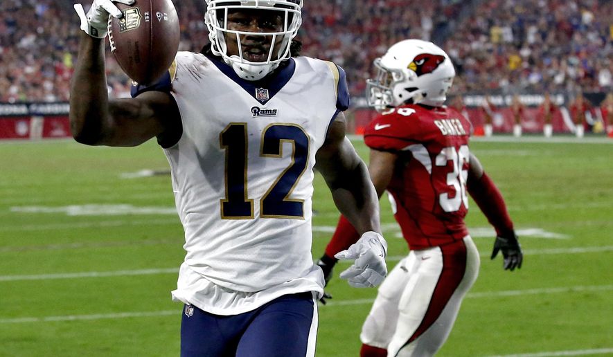 Los Angeles Rams wide receiver Sammy Watkins (12) scores a touchdown against the Arizona Cardinals during the second half of an NFL football game, Sunday, Dec. 3, 2017, in Glendale, Ariz. (AP Photo/Ross D. Franklin)