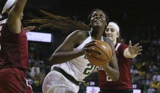 Baylor center Kalani Brown looks to the basket as Stanford forward/center Shannon Coffee, right, defends during the second half of an NCAA college basketball game Sunday, Dec. 3, 2017, in Waco, Texas. (Rod Aydelotte/Waco Tribune Herald via AP)