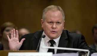 Eric Conn gestures as he invokes his Fifth Amendment rights against self-incrimination during a Senate Homeland Security and Governmental Affairs committee hearing on Capitol Hill in Washington. Conn had help in carrying out the escape plot he hatched a year before fleeing, according to a federal indictment. The indictment, released Monday, Oct. 16, 2017,  alleges that an employee of Conn, the missing lawyer, opened a bank account that Conn used to transfer money out of the country. It also claims that the employee, Curtis Lee Wyatt, tested security at the U.S-Mexico border at Conn&#39;s direction, and purchased a pickup truck for use in Conn&#39;s escape in early June. (AP Photo/ Evan Vucci, File)