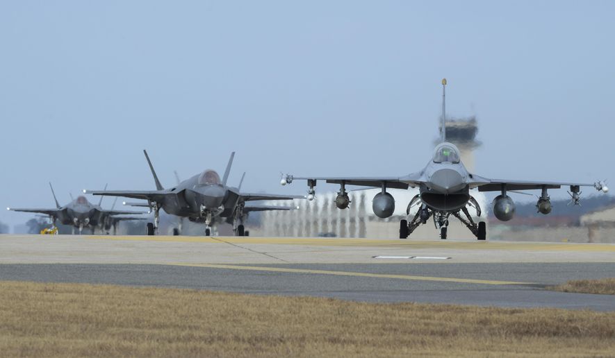 In this Sunday, Dec. 3, 2017, photo provided by U.S. Air Force, a U.S. Air Force F-16 Fighting Falcon, right, and F-35A Lightning IIs assigned to the 34th Expeditionary Fighter Squadron Hill Air Force Base, Utah, taxi toward the end of the runway during the exercise VIGILANT ACE 18 at Kunsan Air Base, South Korea. Hundreds of aircraft including two dozen stealth jets began training Monday, Dec. 4, 2017, as the United States and South Korea launched their biggest-ever combined air force exercise. (Senior Airman Colby L. Hardin/U.S. Air Force photo via AP) **FILE**