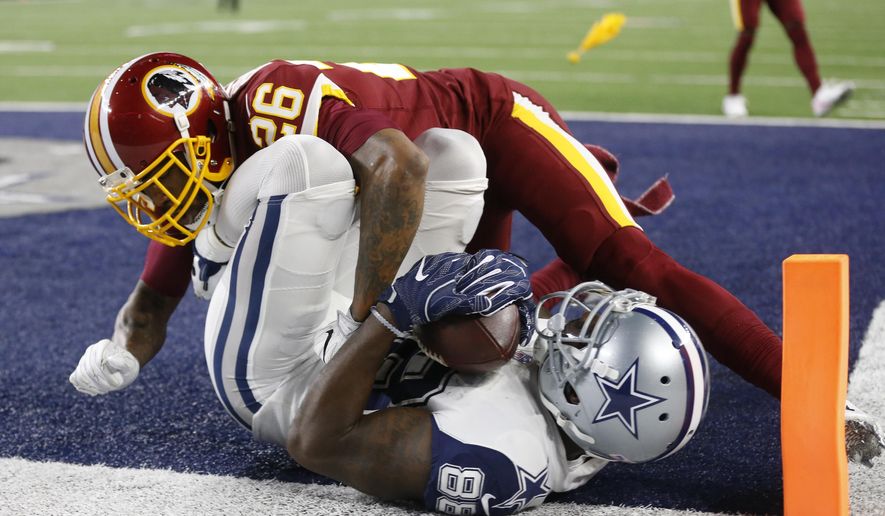 FILE - In this Nov. 30, 2017, file photo, Washington Redskins cornerback Bashaud Breeland (26) lands on top of Dallas Cowboys wide receiver Dez Bryant (88) after Bryant caught a pass for a touchdown in the second half of an NFL football game, in Arlington, Texas. Informed that one estimation gives his Washington Redskins a 1 percent chance of making the playoffs, cornerback Bashaud Breeland opted to take a rose-colored view of the situation. &amp;quot;So we still have something we can play for,&amp;quot; Breeland said after an abbreviated practice Monday, Dec. 4, 2017. &amp;quot;It&#39;s not all the way out of our grasp.&amp;quot;(AP Photo/Ron Jenkins, File)