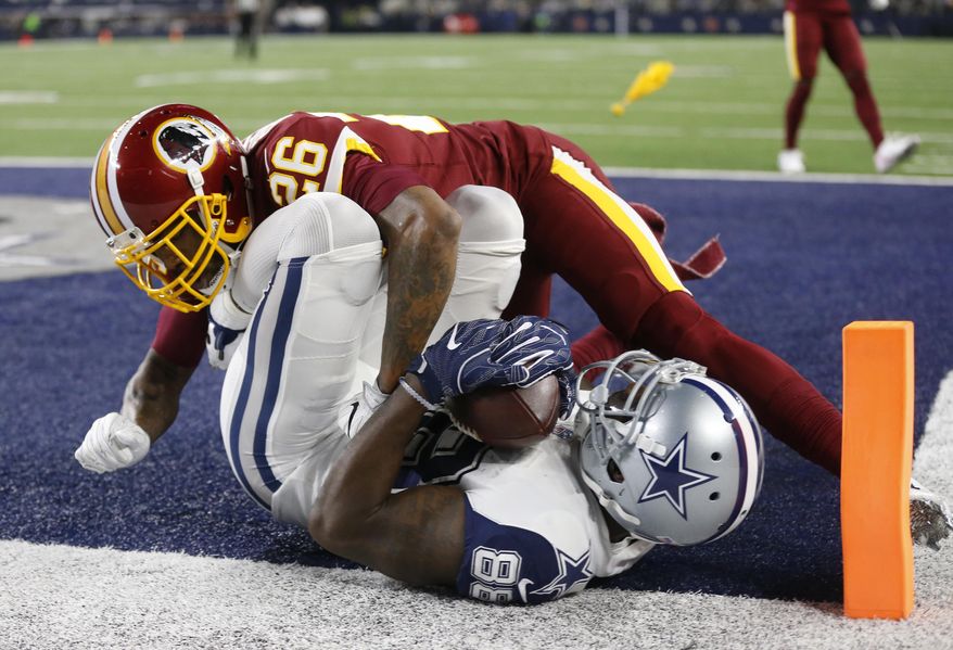 FILE - In this Nov. 30, 2017, file photo, Washington Redskins cornerback Bashaud Breeland (26) lands on top of Dallas Cowboys wide receiver Dez Bryant (88) after Bryant caught a pass for a touchdown in the second half of an NFL football game, in Arlington, Texas. Informed that one estimation gives his Washington Redskins a 1 percent chance of making the playoffs, cornerback Bashaud Breeland opted to take a rose-colored view of the situation. &amp;quot;So we still have something we can play for,&amp;quot; Breeland said after an abbreviated practice Monday, Dec. 4, 2017. &amp;quot;It&#x27;s not all the way out of our grasp.&amp;quot;(AP Photo/Ron Jenkins, File)