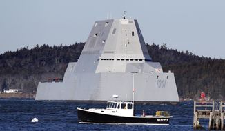 The future USS Michael Monsoor passes Fort Popham travels down the Kennebec River as it heads out to sea for trials, Monday, Dec. 4, 2017, in Phippsburg, Maine. The ship is the second in the stealthy Zumwalt class of destroyers. (AP Photo/Robert F. Bukaty)