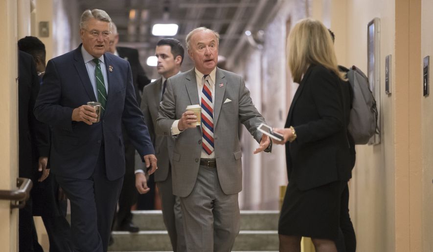 Rep. Rodney Frelinghuysen, R-N.J., chairman of the House Appropriations Committee, center, joined at left by Rep. Rick Allen R-Ga., arrives with fellow House Republicans for a closed-door strategy session on Capitol Hill in Washington, Tuesday, Dec. 5, 2017. (AP Photo/J. Scott Applewhite) ** FILE **