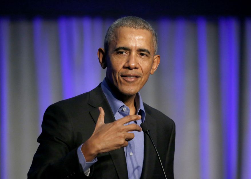 Former U.S. President Barack Obama address the participants at a summit on climate change involving mayors from around the globe Tuesday, Dec. 5, 2017, in Chicago. (AP Photo/Charles Rex Arbogast) ** FILE **