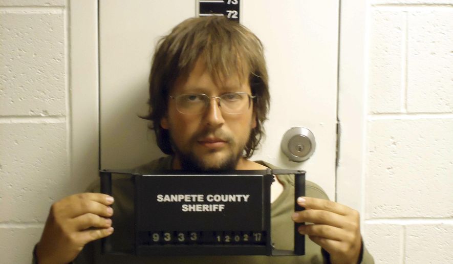 This undated photo provided by Sanpete County Jail shows John Coltharp. Police say Utah men Coltharp and Samuel Shaffer are under arrest after a search near a remote, makeshift compound turned up two girls taken by their father, Coltharp, to join an upstart sect relatives say is based around polygamy and doomsday. Iron County Sheriff's Lt. Del Schlosser said Tuesday, Dec. 5, 2017, the girls aged 4 and 8 were found cold but uninjured after deputies combed the desert near the makeshift compound made of storage containers on Monday. (Sanpete County Jail via AP)