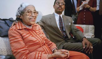 FILE - In this Aug. 31, 1994, file photo, civil rights leader Rose Parks, left, sits in her Detroit home with her lawyer, Gregory Reed during a news conference. Several items that belonged to Parks have been surrendered by Reed, her former attorney in Detroit as part of a bankruptcy case against him. But several items are still missing, including Parks&#39; key to the city, framed gold records, iron slave shackles and an early draft of a book written by Parks. It&#39;s unclear if the items have been sold, lost or hidden. (AP Photo/Jeff Kowalsky File)