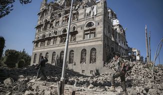 Houthi Shiite rebels inspect the rubble of the Republican Palace that was destroyed by Saudi-led airstrikes, in Sanaa, Yemen, Wednesday, Dec. 6, 2017. Former President Ali Abdullah Saleh was killed on Monday by his onetime allies, the Iran-backed Houthis. Sanaa has witnessed heavy fighting since last week between Saleh’s loyalists and Houthis forcing many Yemenis to cower indoors fearing the violent street clashes. (AP Photo/Hani Mohammed)