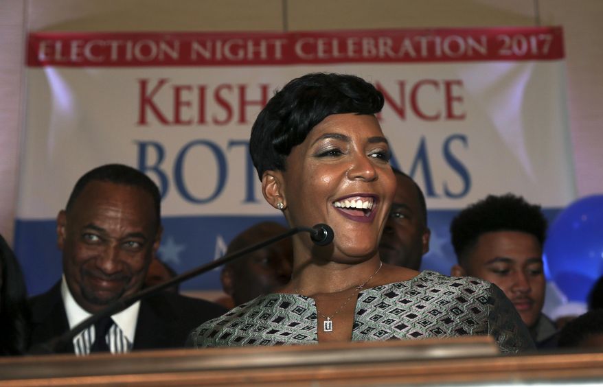 Atlanta mayoral candidate Keisha Lance Bottoms declares victory during an election-night watch party Wednesday, Dec. 6, 2017, in Atlanta. Atlanta&#39;s two-person mayoral runoff election is too close to call. Bottoms leads Mary Norwood by a margin of less than 1 percent, which is the threshold where the second-place finisher can request a recount under state law. (AP Photo/John Bazemore)