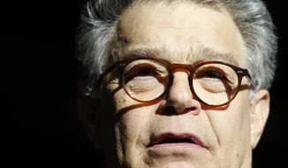 In this Nov. 27, 2017 photo, Sen. Al Franken, D-Minn., speaks to the media on Capitol Hill in Washington. Franken is denying an accusation by a former Democratic congressional aide that he tried to forcibly kiss her after a taping of his radio show in 2006.  (AP Photo/Alex Brandon)
