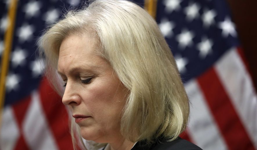 Sen. Kirsten Gillibrand, D-N.Y., listens during a news conference on sexual harassment, Wednesday, Dec. 6, 2017, on Capitol Hill in Washington. Sen. Al Franken's support among his fellow Democrats is cratering as a host of female Democratic senators Wednesday called upon him to resign. (AP Photo/Jacquelyn Martin)