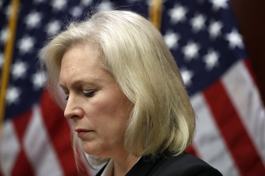 Sen. Kirsten Gillibrand, D-N.Y., listens during a news conference on sexual harassment, Wednesday, Dec. 6, 2017, on Capitol Hill in Washington. Sen. Al Franken's support among his fellow Democrats is cratering as a host of female Democratic senators Wednesday called upon him to resign. (AP Photo/Jacquelyn Martin)