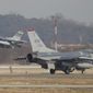 U.S. Air Force F-16 fighter jets take part in a joint aerial drills called Vigilant Ace between U.S and South Korea, at the Osan Air Base in Pyeongtaek, South Korea, Wednesday, Dec. 6, 2017. (Kim Hong-Ji/Pool Photo via AP) ** FILE **
