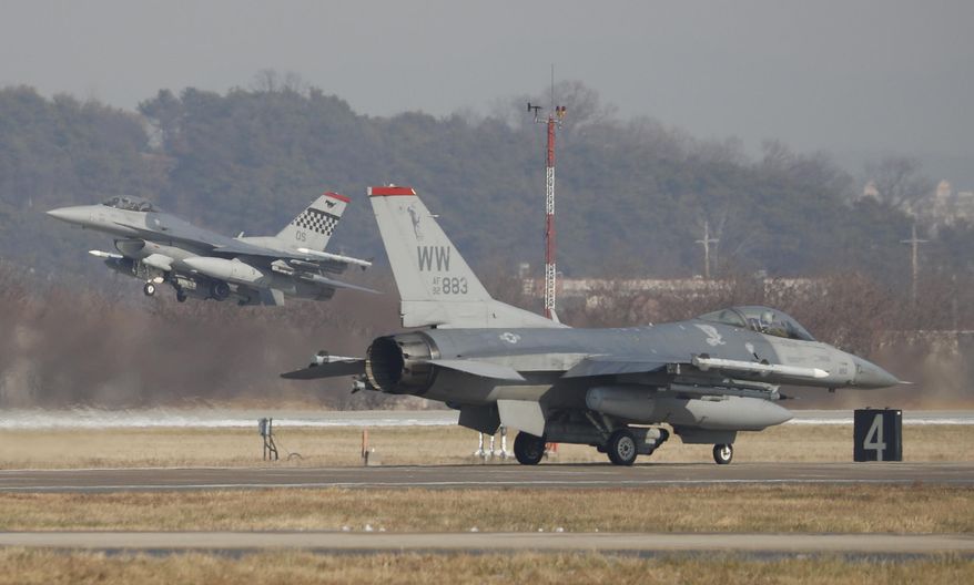 U.S. Air Force F-16 fighter jets take part in a joint aerial drills called Vigilant Ace between U.S and South Korea, at the Osan Air Base in Pyeongtaek, South Korea, Wednesday, Dec. 6, 2017. (Kim Hong-Ji/Pool Photo via AP) ** FILE **
