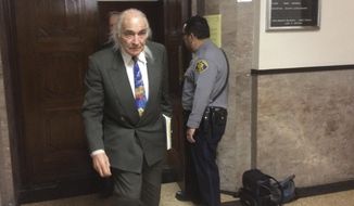 Defense attorney Tony Serra, representing Derick Almena, leaves a courtroom during a break in the preliminary hearing for the two men charged in the blaze at the Ghost Ship warehouse Wednesday, Dec. 6, 2017, in Oakland, Calif. Prosecutors say the men knowingly created a firetrap and deceived the building&#39;s owner, police and fire officials about people living there. The two have pleaded not guilty and say they are being scapegoated.(AP Photo/Sudhin Thanawala)