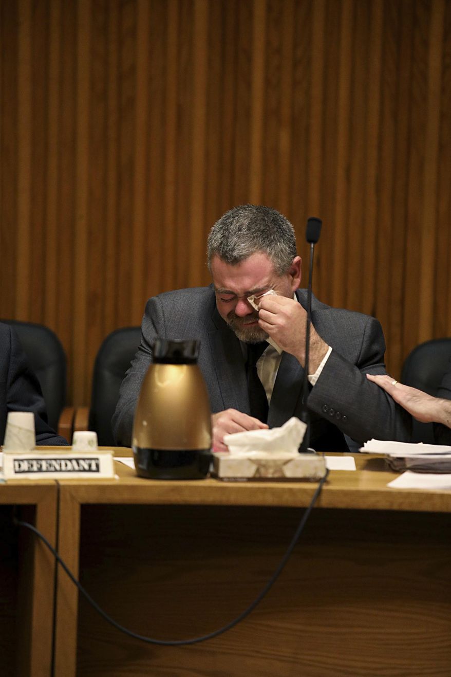 Daniel Cowdrey, of Hartland, Vt., wipes tears from his eyes while his sister speaks to his character on Wednesday, Dec. 6, 2017, during the sentencing of Cowdrey at the Grafton Superior Court in North Haverhill, N.H. Cowdrey pleaded guilty to negligent homicide and aggravated driving under the influence in the crash that killed Ellynn Koelsch, 34, on the evening of May 26, 2016. (Charles Hatcher /The Valley News via AP)