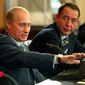 Mikhail Lesin (right) served as a top press aide to Russian President Vladimir Putin until 2009. As his broadcast network RT expanded, he had a falling-out with Mr. Putin, one American intelligence source said, and he moved his family to California. (REUTERS/ITAR-TASS/KREMLIN PRESS SERVICE)