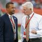 FILE - In this Aug. 18, 2016, file photo, Sashi Brown, acting executive vice president of football operations for the Cleveland Browns, left, speaks with Browns&#39; owner Jimmy Haslam during practice before an NFL preseason football game against the Atlanta Falcons, in Cleveland. A person familiar with the decisions says the Cleveland Browns have fired Sashi Brown, the club’s vice president of football operations. Brown, who was named the team’s top executive by owners Dee and Jimmy Haslam during an overhaul following the 2015 season, was relieved of his duties on Thursday, Dec. 7, 2017, said the person who spoke to the Associated Press on condition of anonymity because the team has not announced the move. (AP Photo/Ron Schwane)