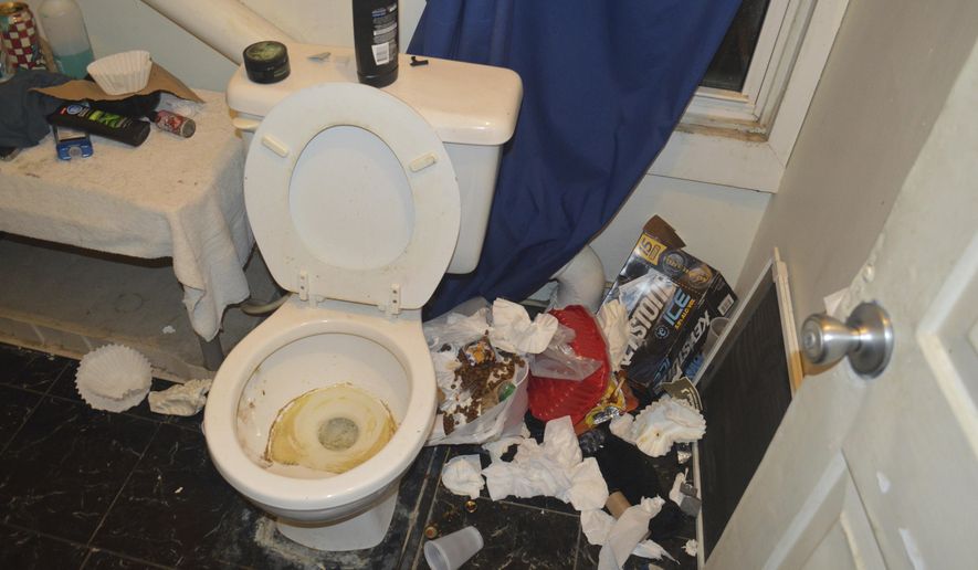 In this Nov. 29, 2017 photo provided by the Brockport Police Department in Brockport, N.Y., filthy conditions inside a bathroom at a house belonging to an unsanctioned fraternity near Brockport College are shown. Police arrested members of the unrecognized fraternity at the New York state college on Thursday, Dec. 7, 2017. Charges included various misdemeanor counts of hazing, criminal nuisance, assault and alcohol-related unlawfully dealing with a child. One of the men was charged with criminal possession of a controlled substance and two with animal cruelty. (Brockport Police Department via AP)