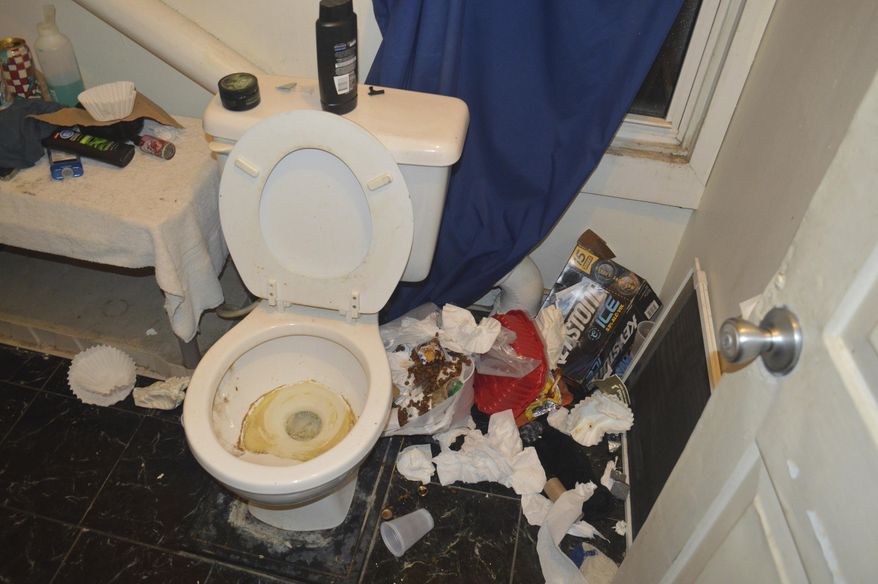 In this Nov. 29, 2017 photo provided by the Brockport Police Department in Brockport, N.Y., filthy conditions inside a bathroom at a house belonging to an unsanctioned fraternity near Brockport College are shown. Police arrested members of the unrecognized fraternity at the New York state college on Thursday, Dec. 7, 2017. Charges included various misdemeanor counts of hazing, criminal nuisance, assault and alcohol-related unlawfully dealing with a child. One of the men was charged with criminal possession of a controlled substance and two with animal cruelty. (Brockport Police Department via AP)