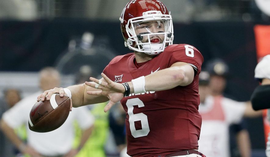 FILE - In this Dec. 2, 2017, file photo, Oklahoma quarterback Baker Mayfield (6) throws a pass in the first half of the Big 12 Conference championship NCAA college football game against TCU in Arlington, Texas. Mayfield, reigning Heisman winner Lamar Jackson of Louisville and Stanford running back Bryce Love were chosen as finalists for the Heisman Trophy on Monday, Dec. 4, 2017. (AP Photo/Tony Gutierrez, File)