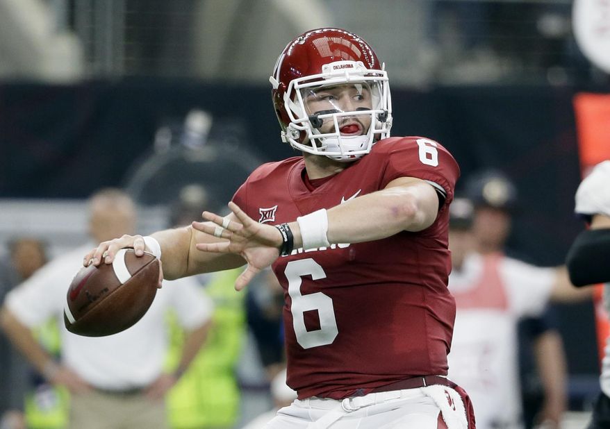 FILE - In this Dec. 2, 2017, file photo, Oklahoma quarterback Baker Mayfield (6) throws a pass in the first half of the Big 12 Conference championship NCAA college football game against TCU in Arlington, Texas. Mayfield, reigning Heisman winner Lamar Jackson of Louisville and Stanford running back Bryce Love were chosen as finalists for the Heisman Trophy on Monday, Dec. 4, 2017. (AP Photo/Tony Gutierrez, File)