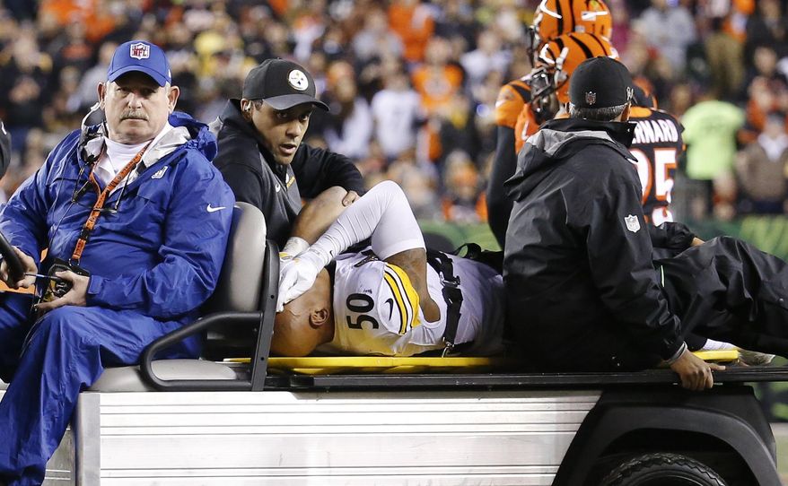 FILE - In this Monday, Dec. 4, 2017, file photo, Pittsburgh Steelers inside linebacker Ryan Shazier (50) is carted off the field after an injury in the first half of an NFL football game against the Cincinnati Bengals, in Cincinnati. The Steelers are spending this week trying to figure out who to play at inside linebacker in place of injured Ryan Shazier. (AP Photo/Frank Victores, File)