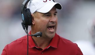 FILE - In this April 22, 2017, file photo, Alabama defensive coordinator Jeremy Pruitt, coach of the White team, yells to his team during Alabama&#39;s annual A-Day spring NCAA college football game in Tuscaloosa, Ala. Tennessee has hired Pruitt as its head coach on Thursday, Dec. 7, 2017, capping a tumultuous search that cost an athletic director his job as the Volunteers attempt to recover from one of their most disappointing seasons.(Gary Cosby Jr./The Tuscaloosa News via AP, File)