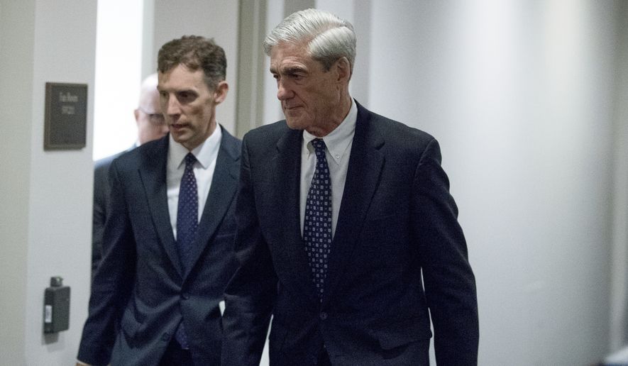 In this June 21, 2017, file photo, former FBI Director Robert Mueller, the special counsel probing Russian interference in the 2016 election, departs Capitol Hill following a closed-door meeting in Washington. (AP Photo/Andrew Harnik, File)