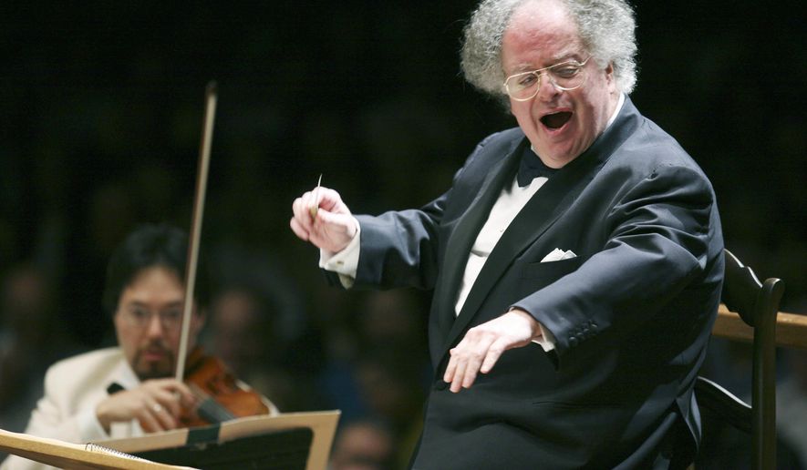 FILE - In this July 7, 2006 file photo, Boston Symphony Orchestra music director James Levine conducts the symphony on its opening night performance at Tanglewood in Lenox., Mass.  Longtime Metropolitan Opera conductor Levine has denied allegations of sexual misconduct and says he wants to resume his work "with full concentration and inspiration." "As understandably troubling as the accusations noted in recent press accounts are, they are unfounded," Levine said in a statement issued Thursday, Dec. 7, 2017,  to The New York Times . "As anyone who truly knows me will attest, I have not lived my life as an oppressor or an aggressor." The opera suspended Levine on Sunday after the Times published accounts from three of the accusers who say that Levine sexually abused them when they were teenagers. A fourth accuser later came forward.  (AP Photo/Michael Dwyer, File)