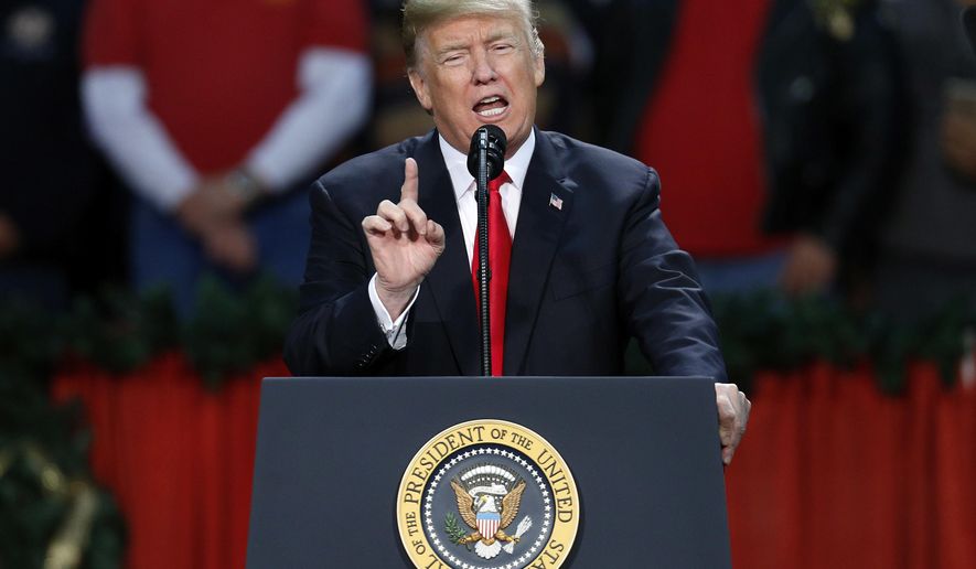 President Donald Trump speaks during a rally in Pensacola, Fla., Friday, Dec. 8, 2017. (AP Photo/Jonathan Bachman)