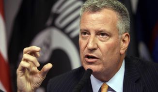 FILE- In this Aug. 8, 2015 file photo, New York City Mayor Bill de Blasio speaks during a news conference in New York. According to genealogy company MyHeritage, de Blasio shares an ancestor with one of his predecessors, Mayor Robert Anderson Van Wyck, who was elected to the office in 1897. MyHeritage says the two mayors are 11th cousins five times removed. (AP Photo/Mary Altaffer, File)