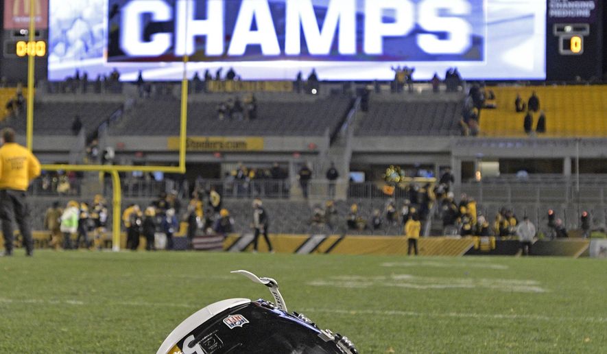 The helmet of Pittsburgh Steelers inside linebacker Ryan Shazier (50) sits on the field after an NFL football game between the Pittsburgh Steelers and the Baltimore Ravens in Pittsburgh, Monday, Dec. 11, 2017. The Steelers won one for injured star Shazier and wrapped up the AFC North in the process. The Steelers beat the Baltimore Ravens 39-38 to capture the AFC North Championship. (AP Photo/Don Wright)
