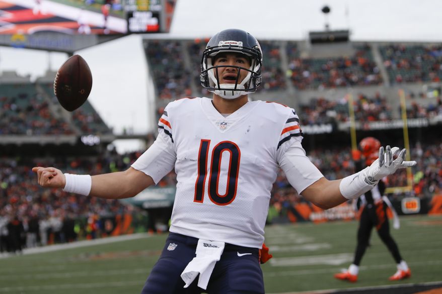 FILE - In this Sunday, Dec. 10, 2017, file photo, Chicago Bears quarterback Mitchell Trubisky celebrates after running in a touchdown in the second half of an NFL football game against the Cincinnati Bengals in Cincinnati. Trubisky had his best game as a pro and the Chicago Bears saw their offense sprung to life. They hope to keep that going against the Detroit Lions on Saturday after a blowout win at Cincinnati to stop a five-game losing streak. (AP Photo/Frank Victores, File)