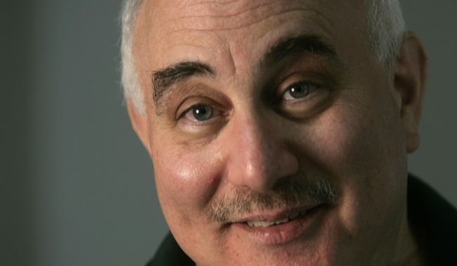 FILE- In this May 29, 2009 file photo, David Berkowitz poses during an interview at Sullivan Correction Facility in Fallsburg, N.Y.  The "Son of Sam" serial killer who terrorized New York City 40 years ago has been hospitalized for a reported heart ailment. New York state prison officials said Tuesday, Dec. 12, 2017, that 64-year-old Berkowitz was transferred to a hospital from the upstate maximum-security prison where he is serving a life sentence. (AP Photo/Mike Groll, File)