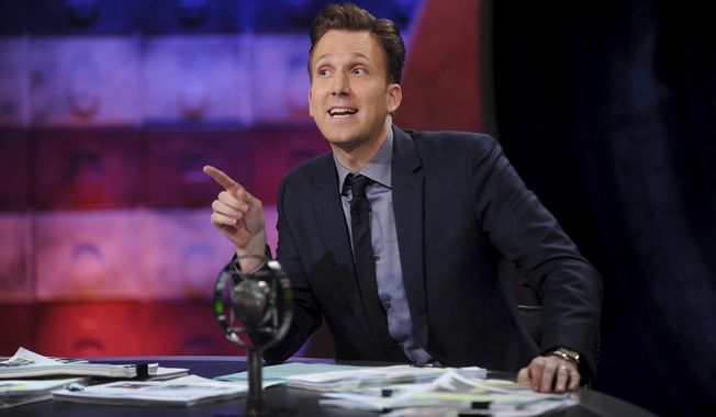 This Sept. 25, 2017 image released by Comedy Central shows comedian Jordan Klepper hosting the premiere of &amp;quot;The Opposition w/ Jordan Klepper&amp;quot; in New York. Adapting to the current media ethos with its ever harsher, ever more absurdist pitch, Klepper hosts a supercharged version of &amp;quot;The Colbert Report,&amp;quot; whose time slot he inherited in September when he unveiled his fake rantcast. (Brad Barket/Comedy Central via AP)